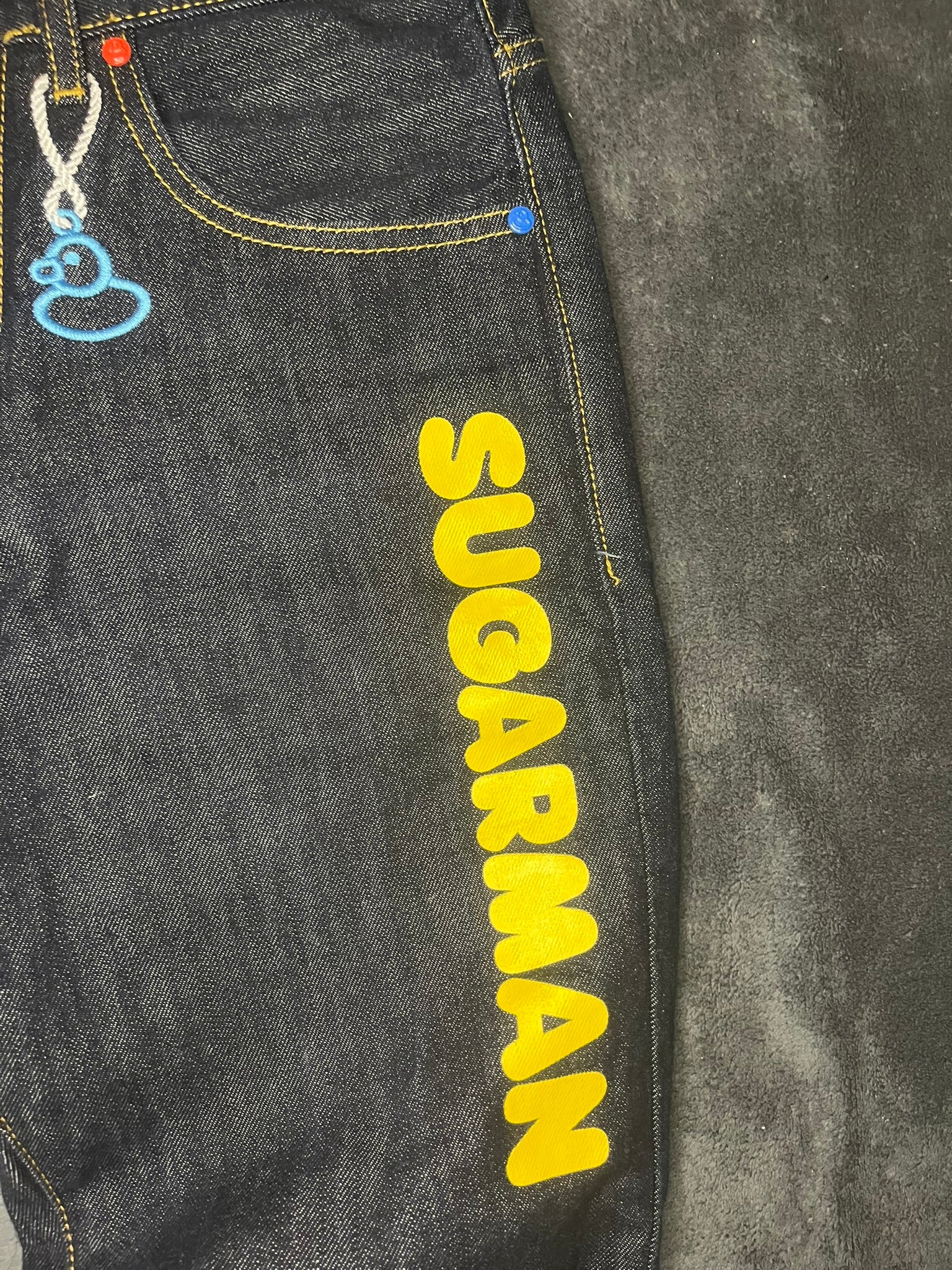 y2k-sugarman-printed-stitched-jeans